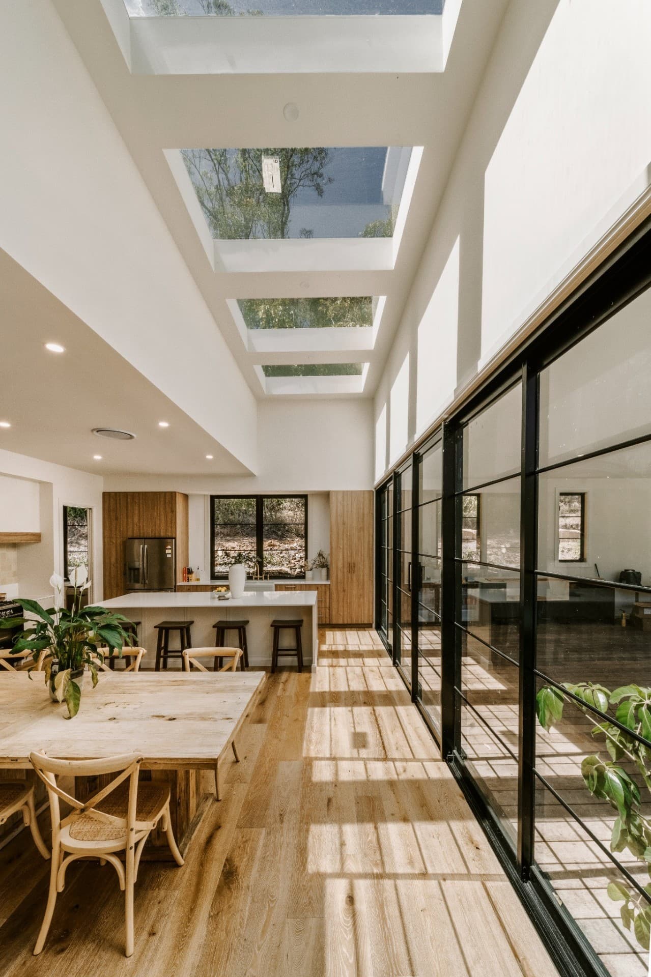 Yandala custom home interior with skylights, open plan kitchen and dining.