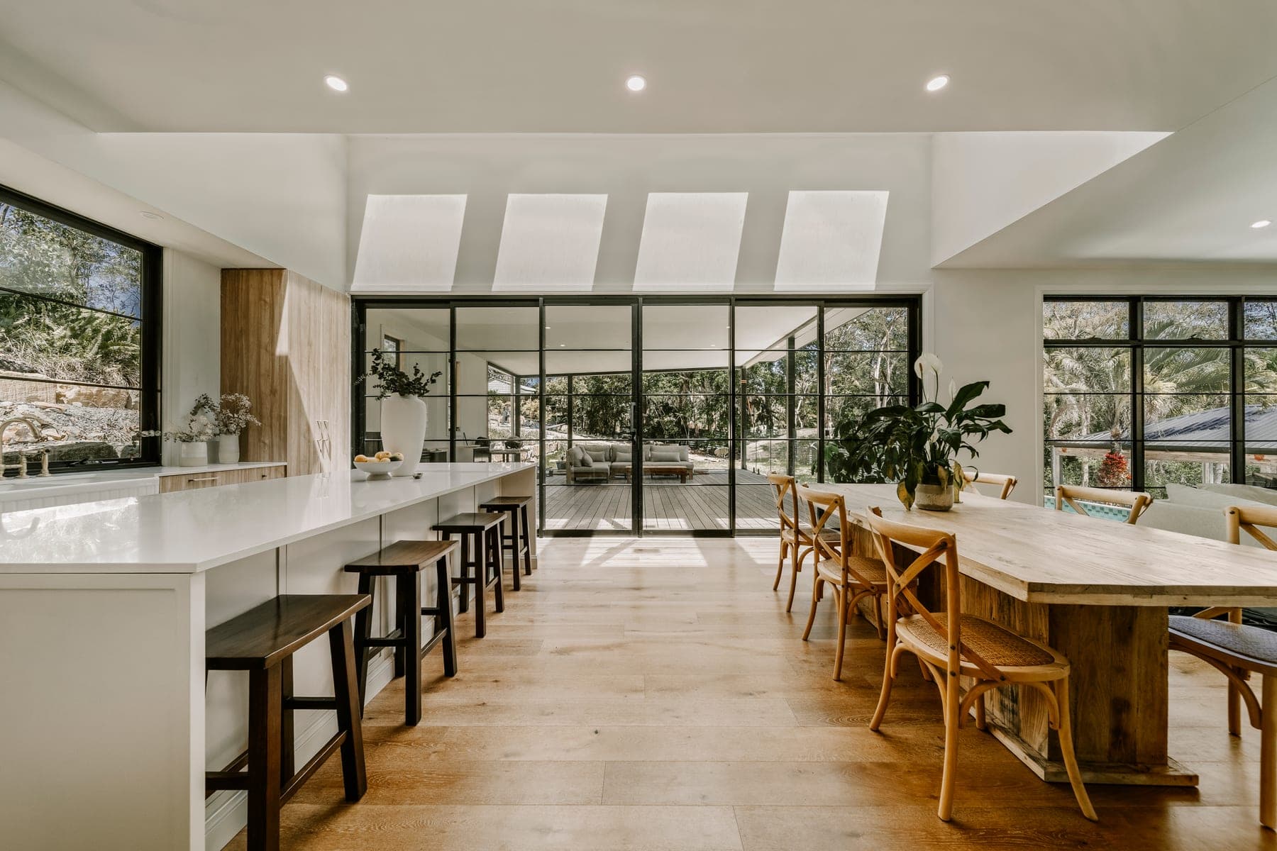 Custom built family home on the Gold Coast by All Leonard Build, with timber, stone and glass facade.